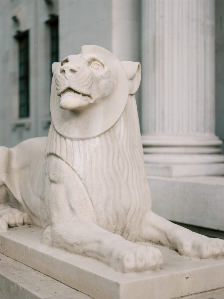Statue of a lion in front of London Old Marylebone Town Hall